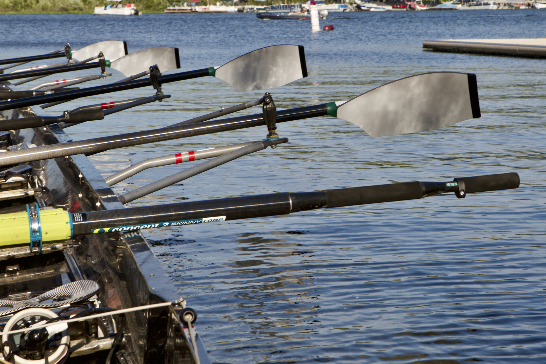A boat with a set of sweeps lined up in the oarlock