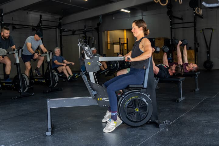 woman using concept2 strengtherg